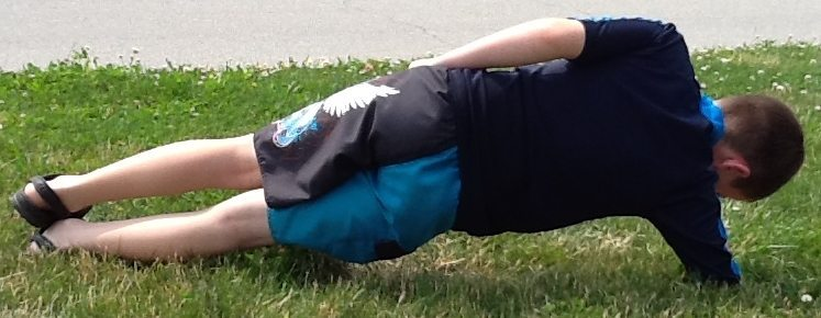 child doing plank exercise 2