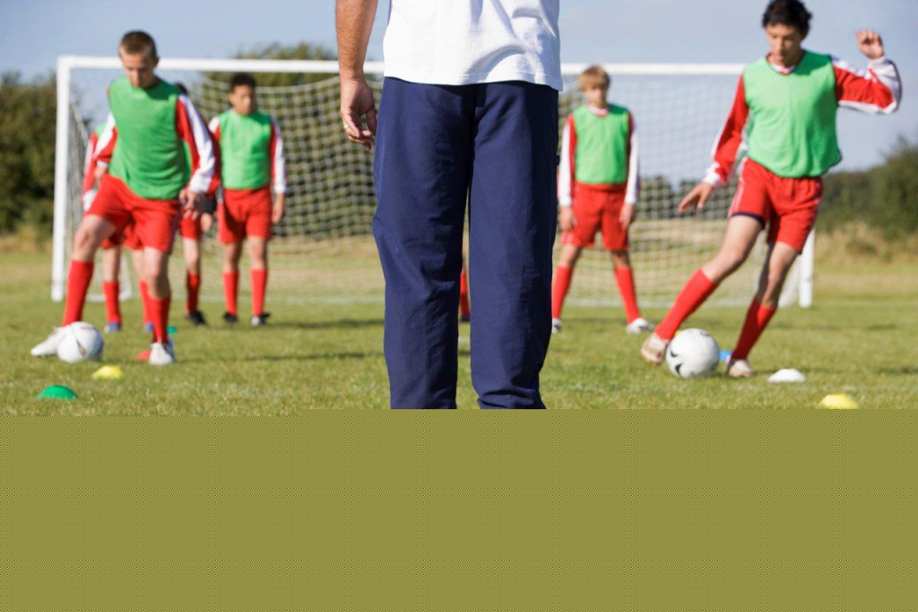 coach doing motivational drills with their team