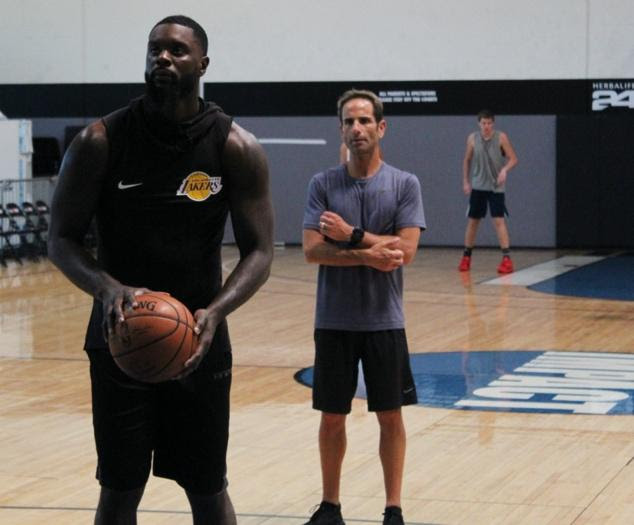 2 men in basketball court