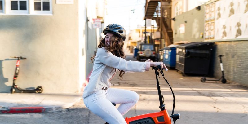girl riding an e-bike