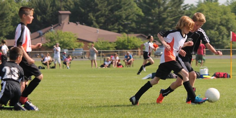 Children playing soccer