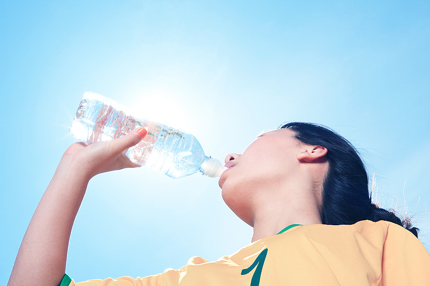 Child keeping hydrated with water