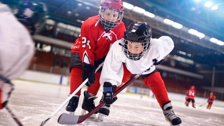 Boys playing hockey