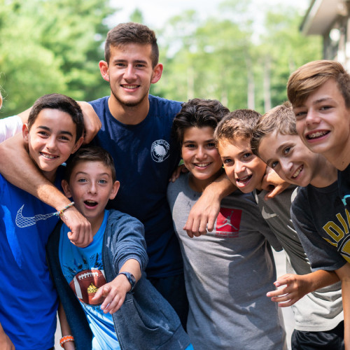 Smiling teenagers in photo for after school program
