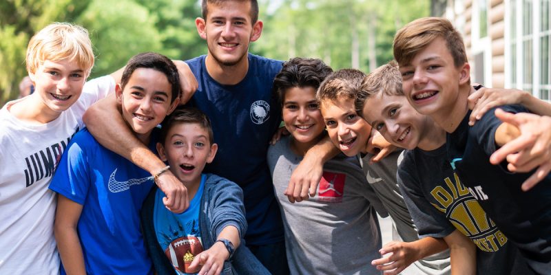 Smiling teenagers in photo for after school program