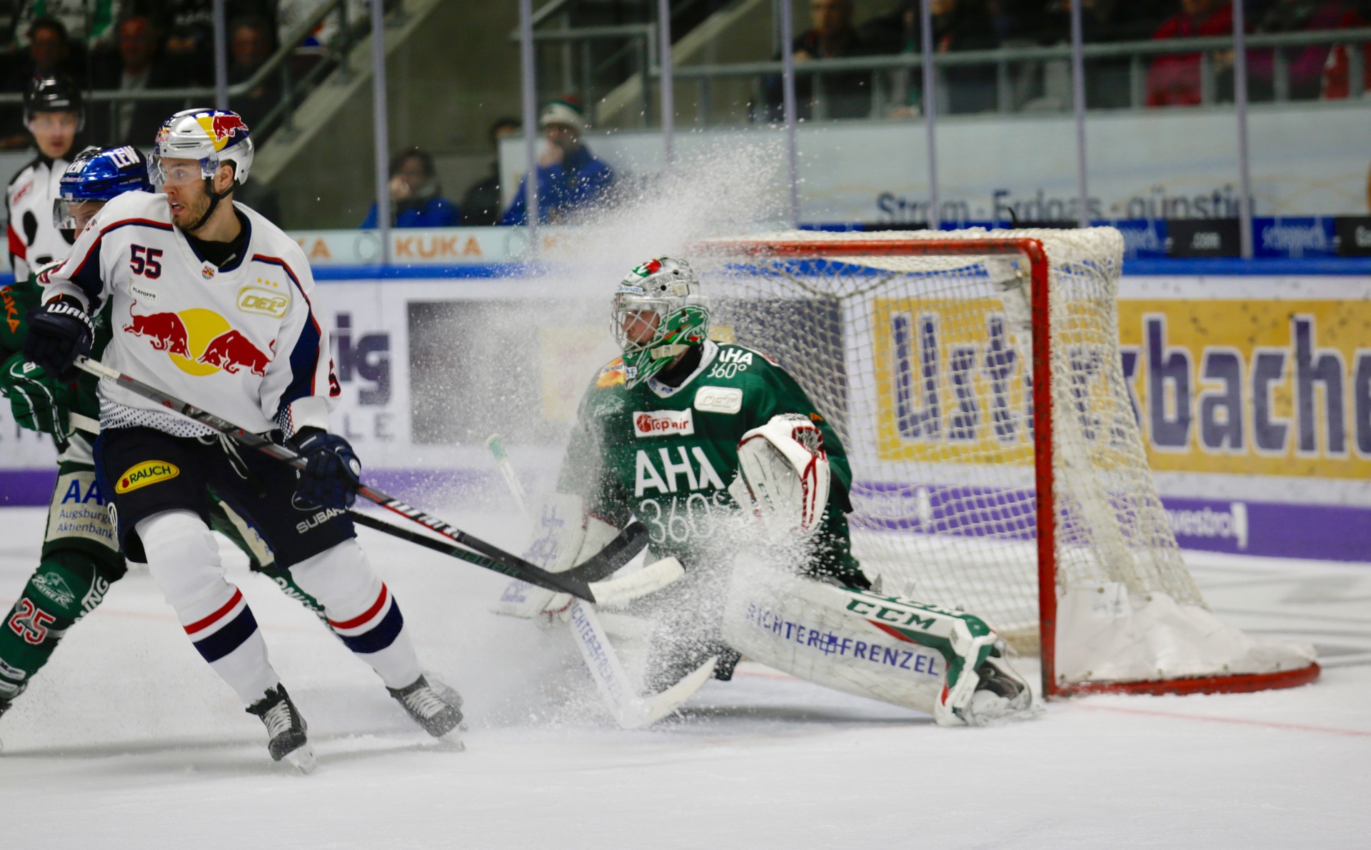 Hockey player scoring goal during game