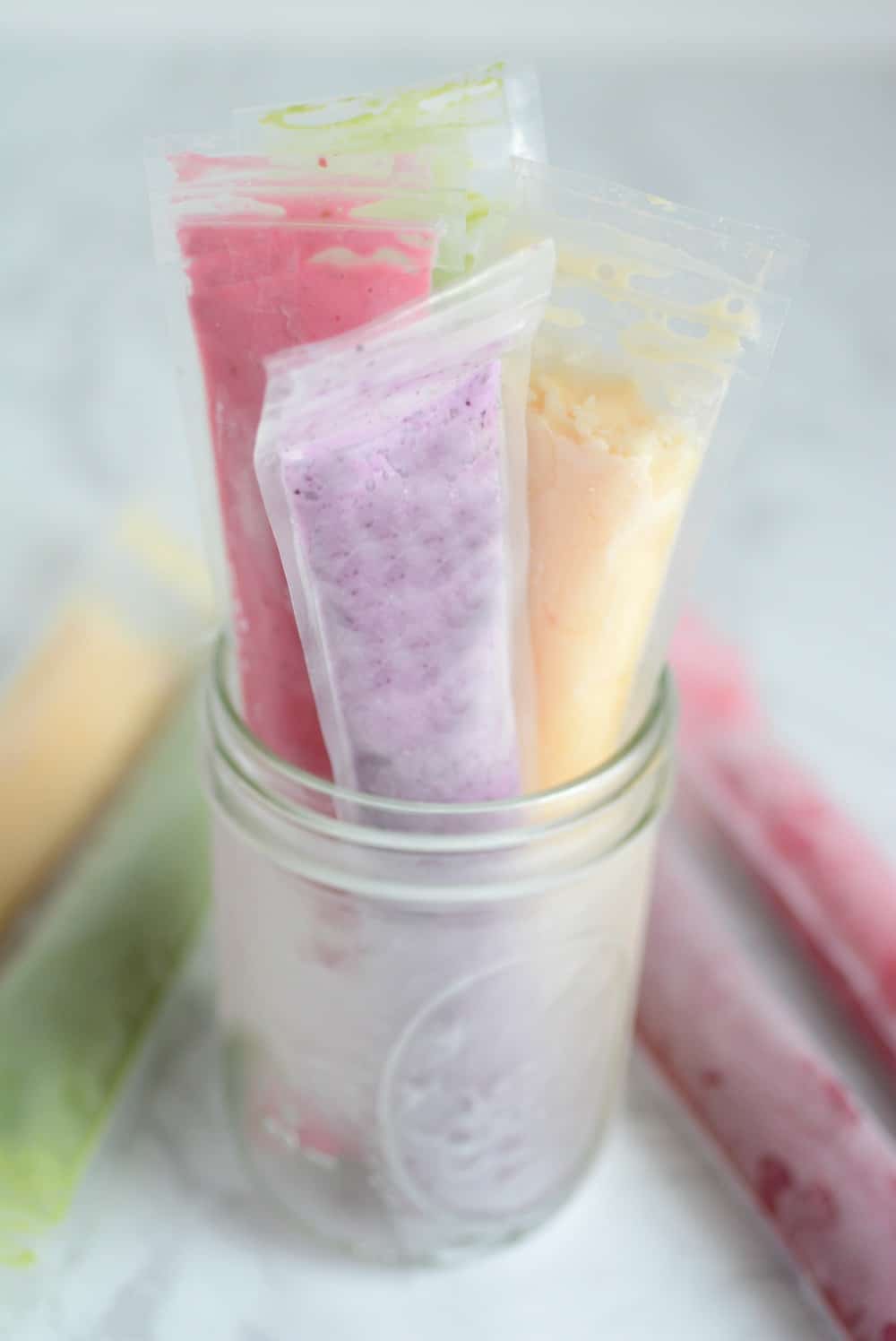 Yogurt tubes in glass jar