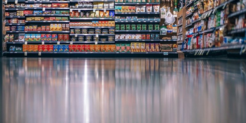 Grocery store aisle packed with snacks